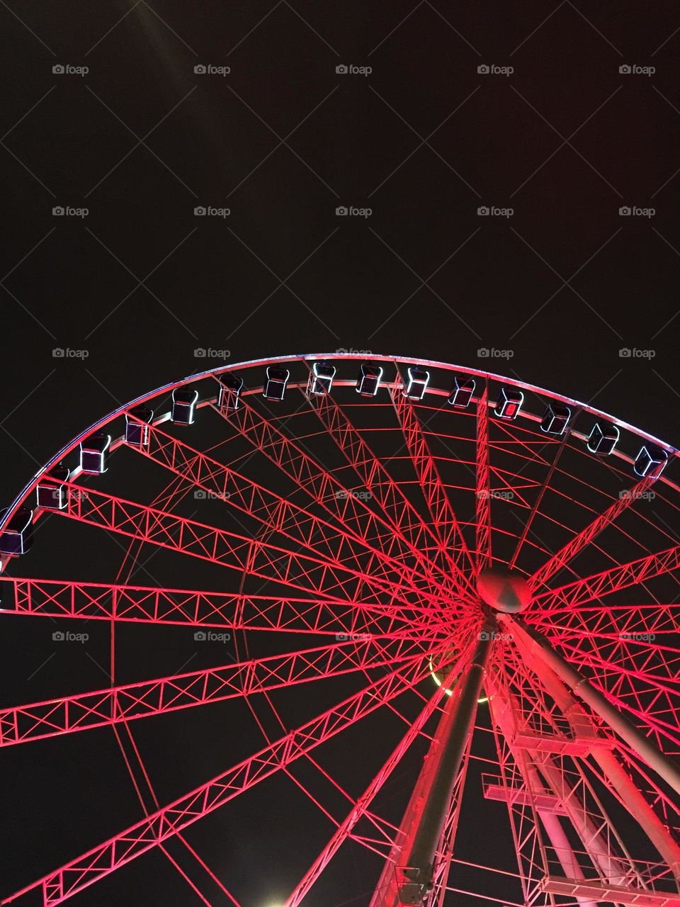 Giant red wheel on Black Sky