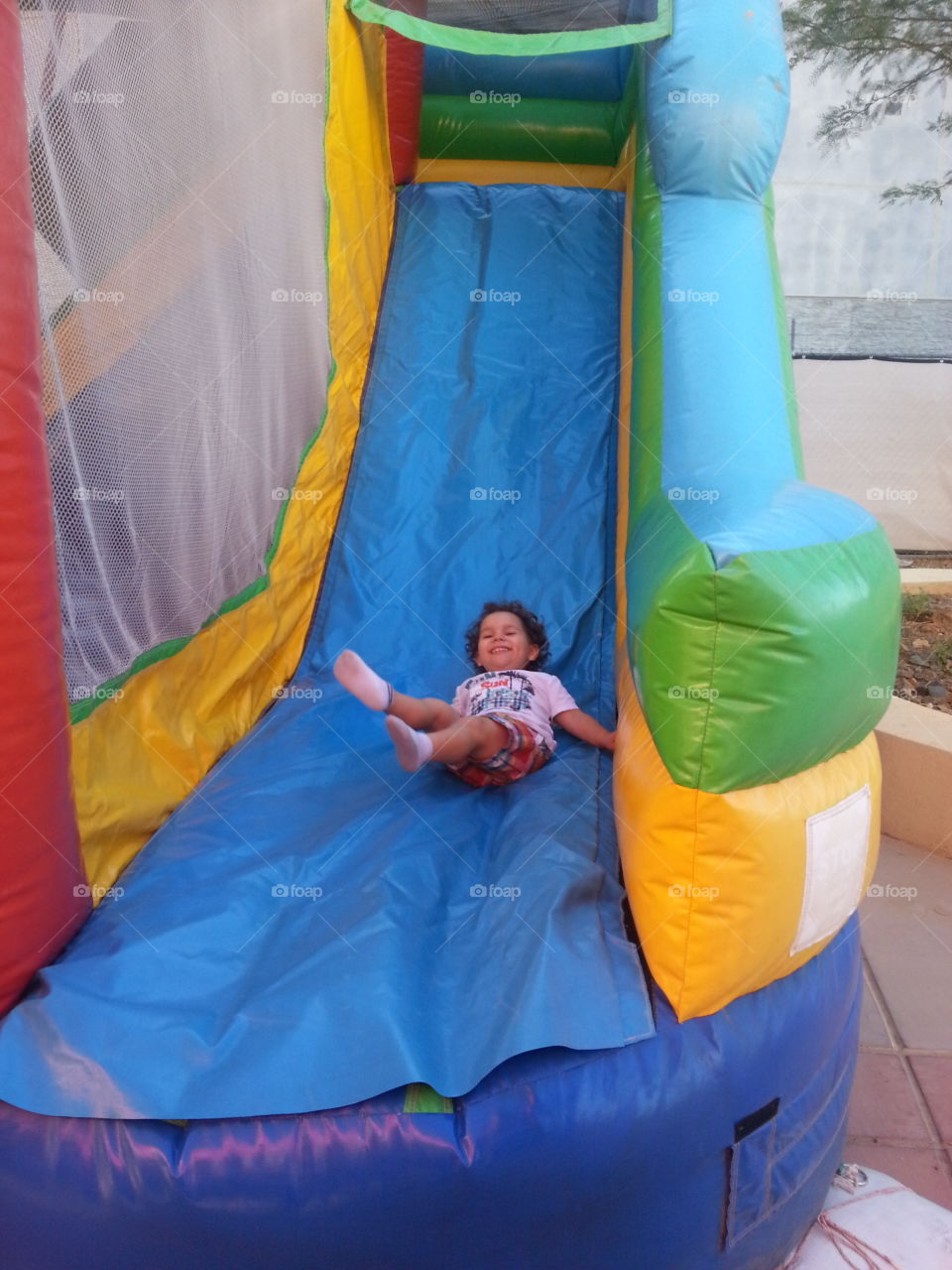 Happy Child on a Slide.