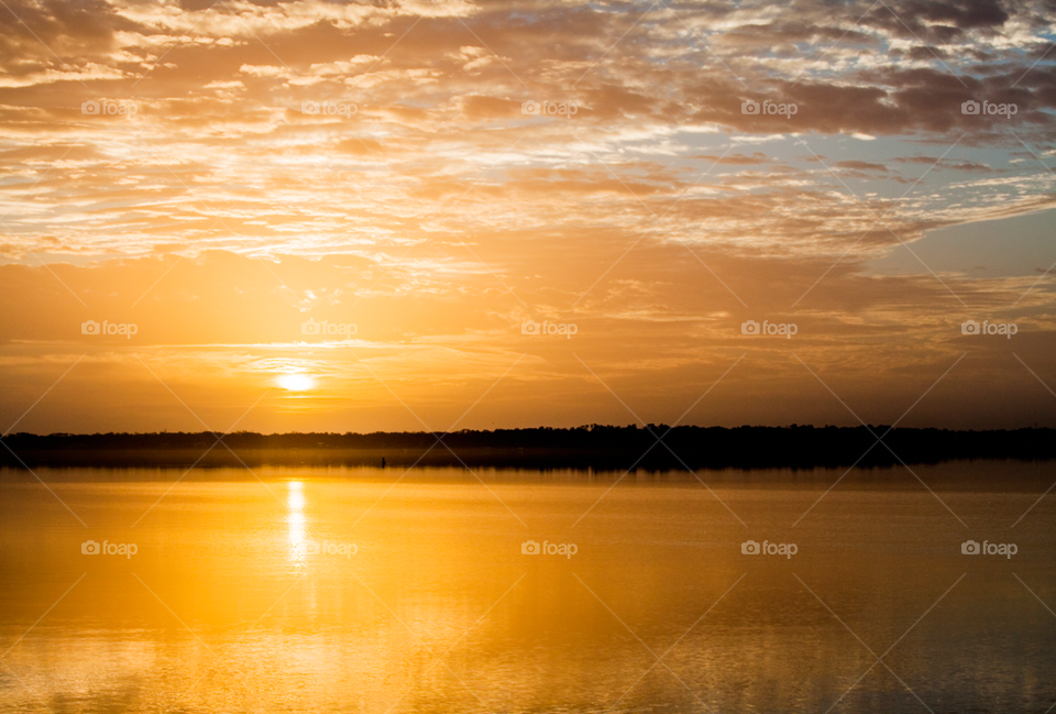 Sunrise over the water