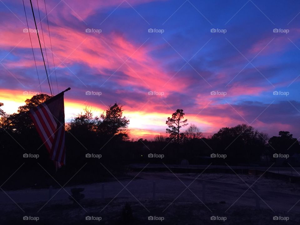 Star Spangled Banner. This is the U.S. Flag flying during a beautiful NC Sunset. 