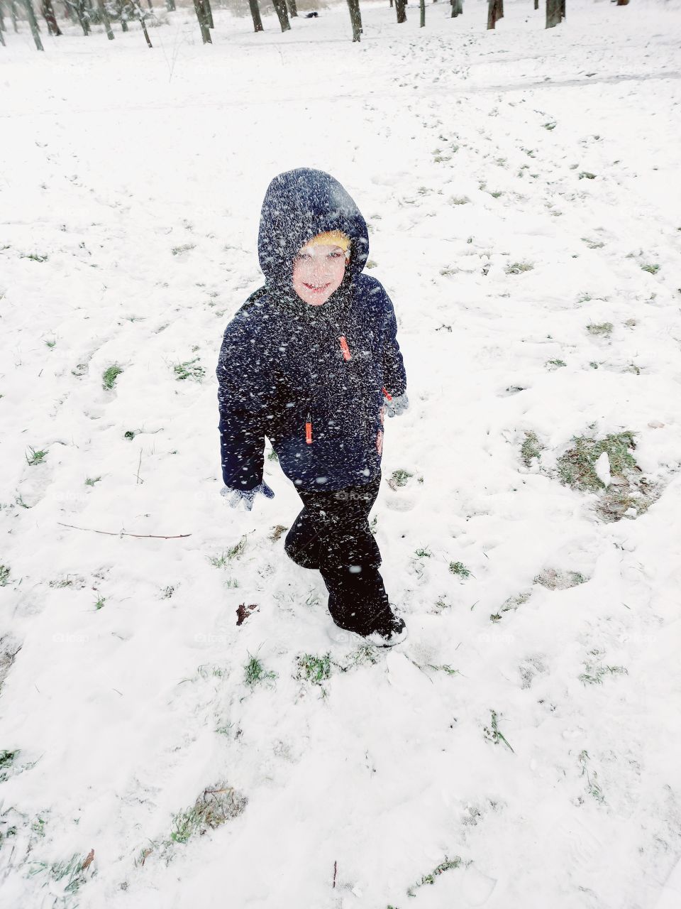 boy playing snow