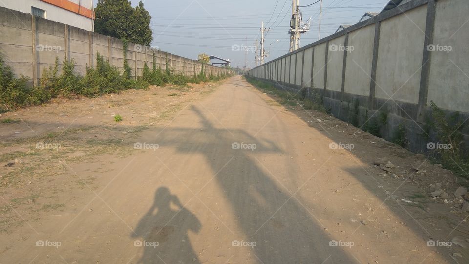 wall fence between two factories