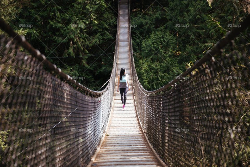 Woman Walks Bridge -