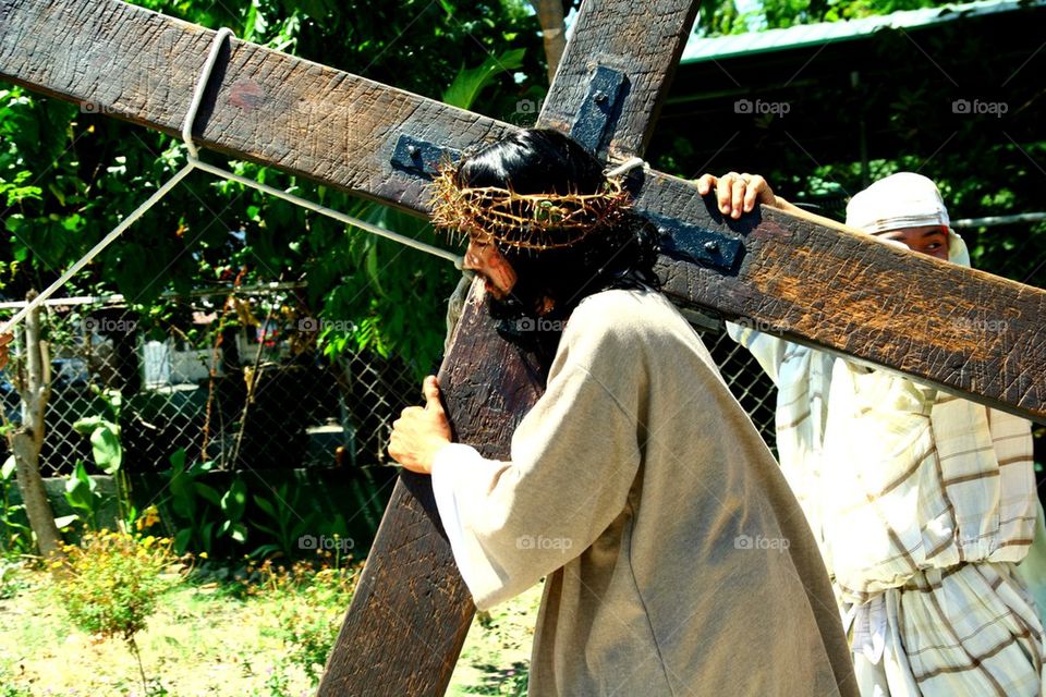 catholic devotees reenact the death of jesus christ on good friday during holy week in cainta, rizal, philippines, asia