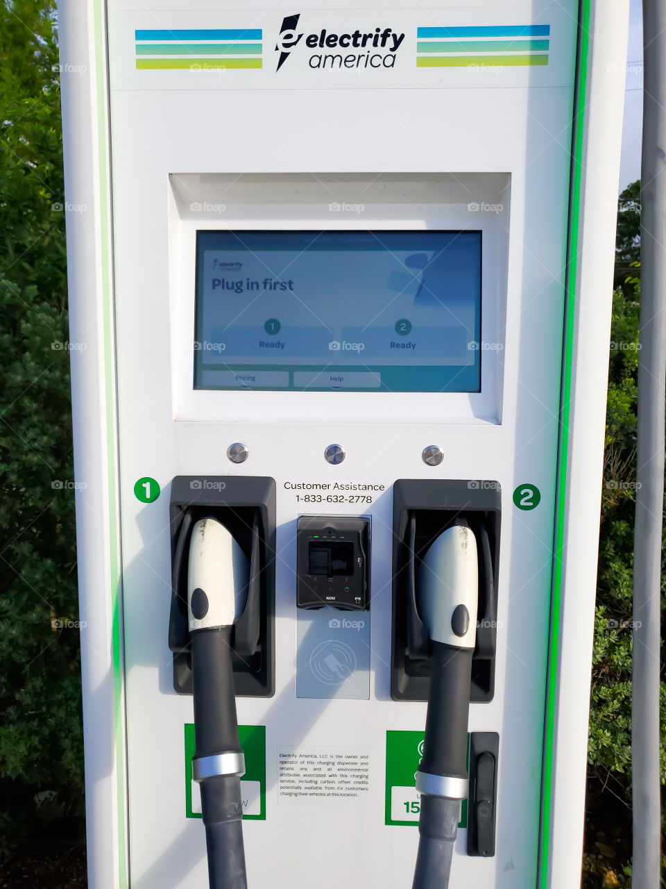 Closeup: electrify america electric vehicle charging station pump
