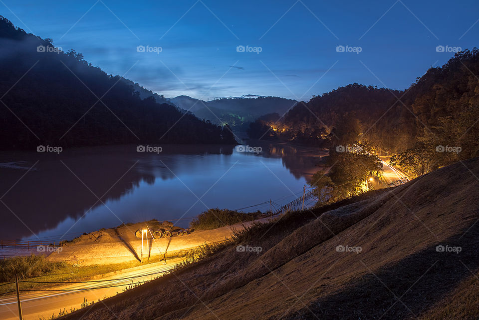 View of idyllic river with road