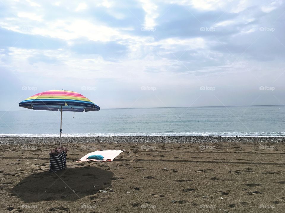 Lonely Umbrella on the Beach
