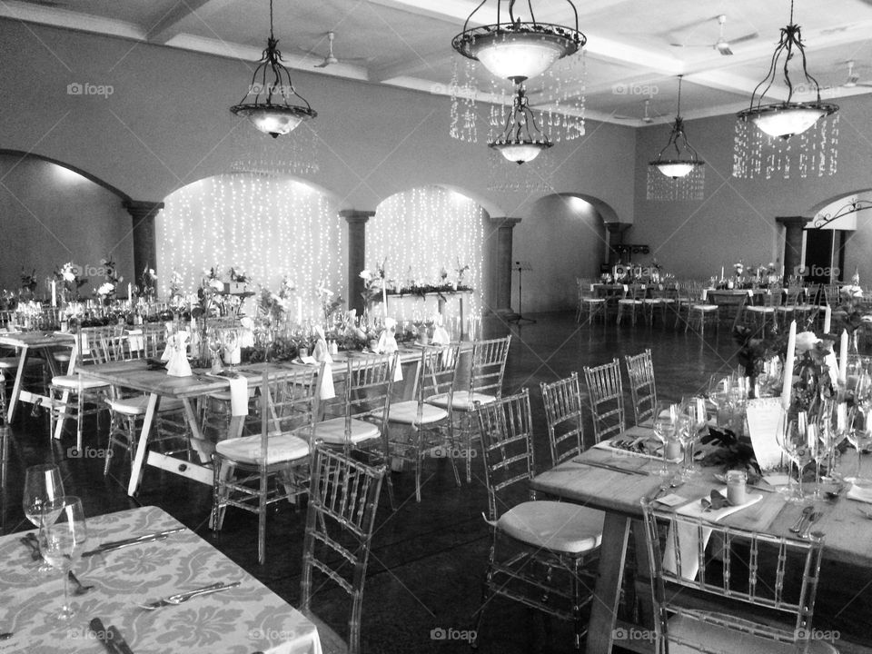 Inside vibe- chairs, tables, chandeliers 