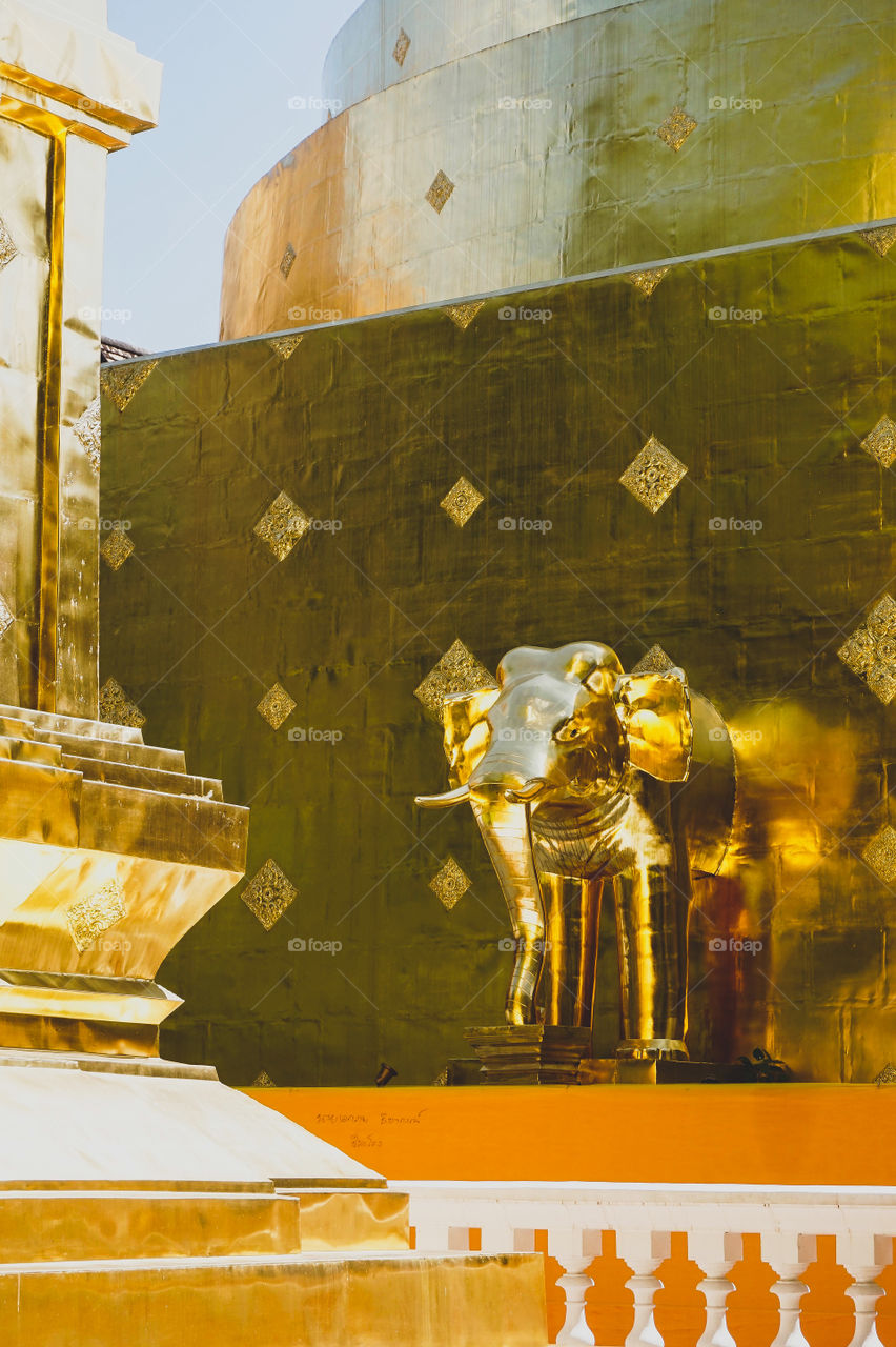 Gold elephant on the stupa of Wat Phra Singh, Chiang Mai 