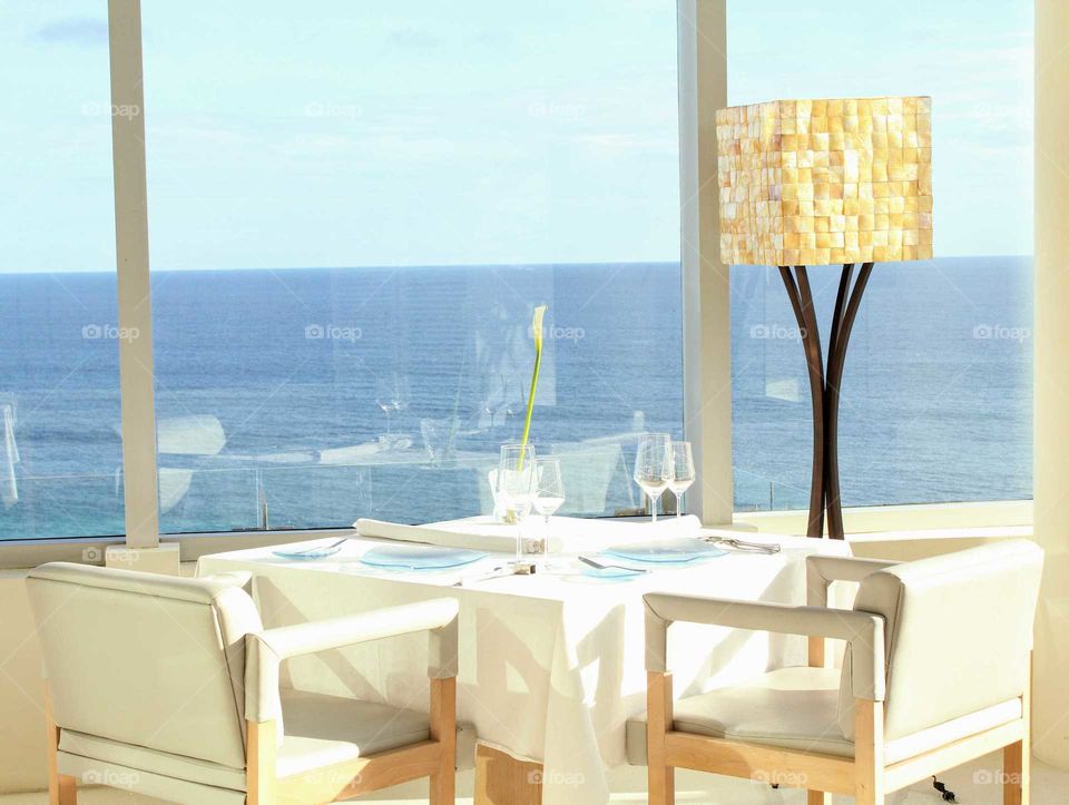 Fine dining table with seaview glass window