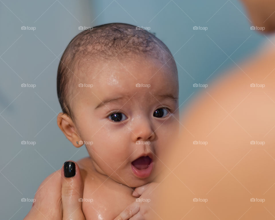 Cute Baby having shower