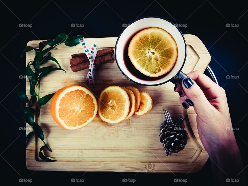 Woman holding cup of coffee