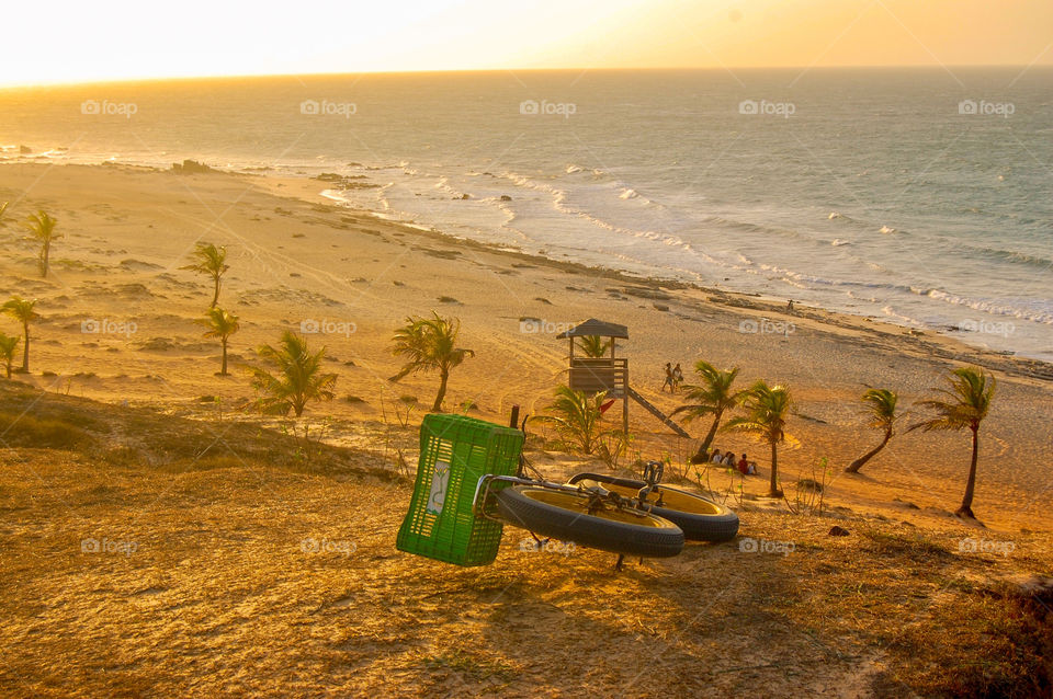 Bicycle against panoramic view of beach 