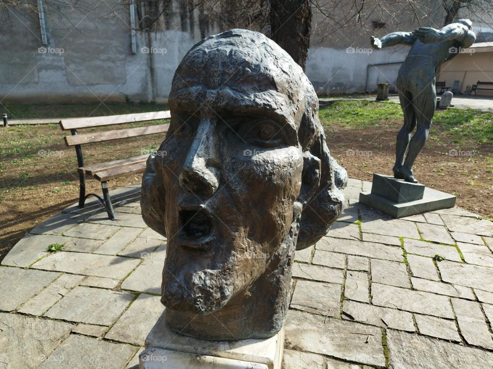 The winner statues in Bucharest gardens