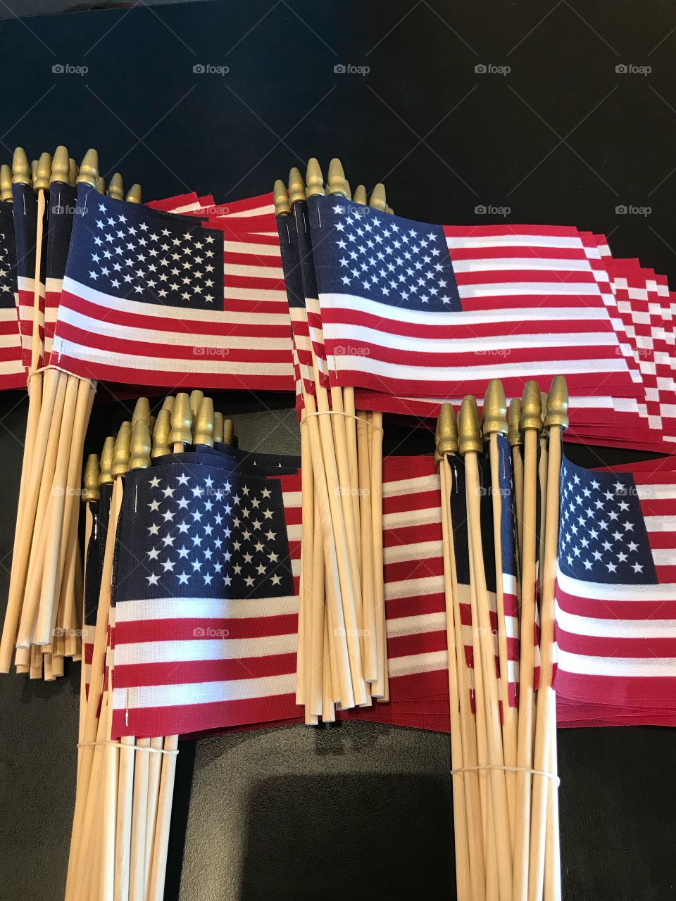 A bunch of small American flags