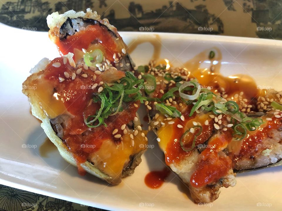 Spicy Sushi Roll With Eel And Hot Sauce