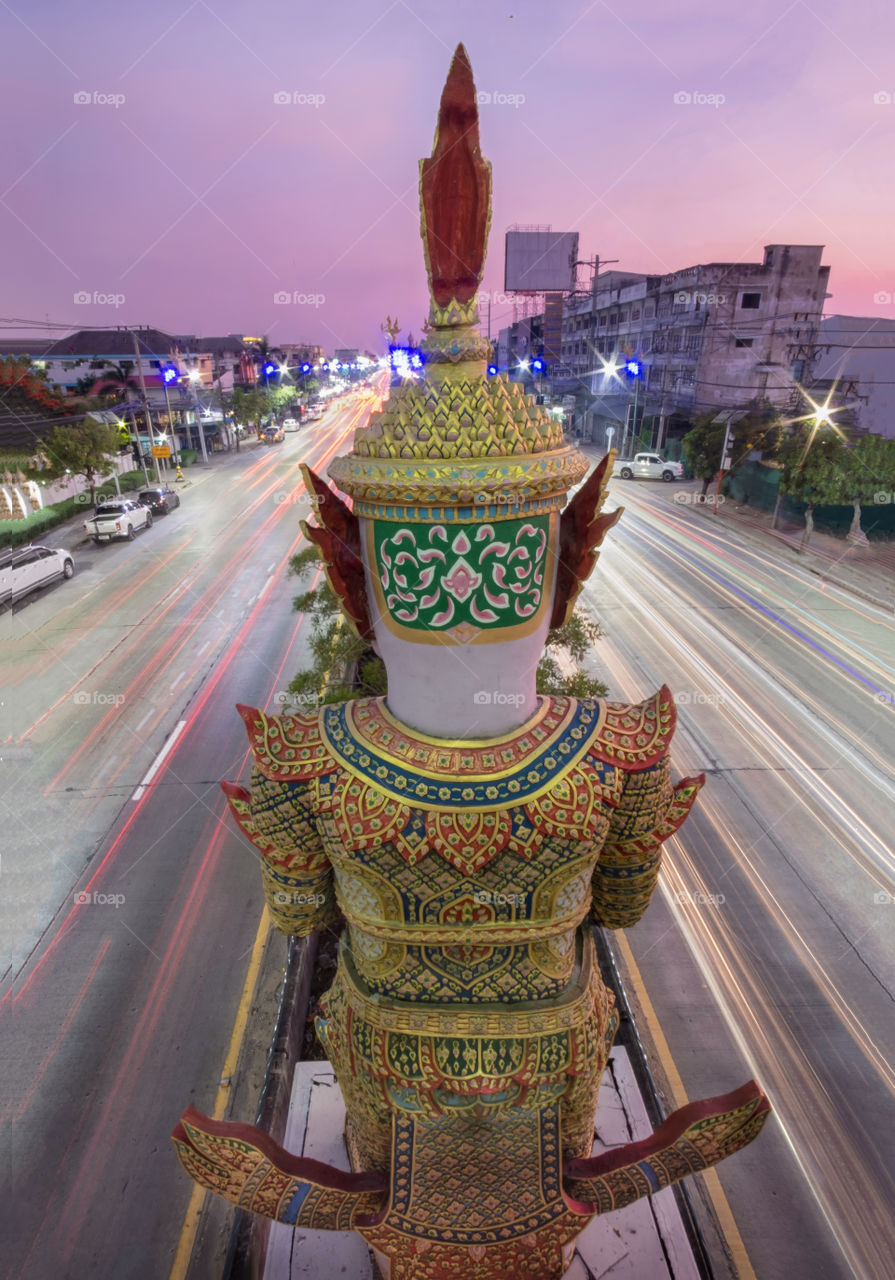 Long posure of vehicle light on road
