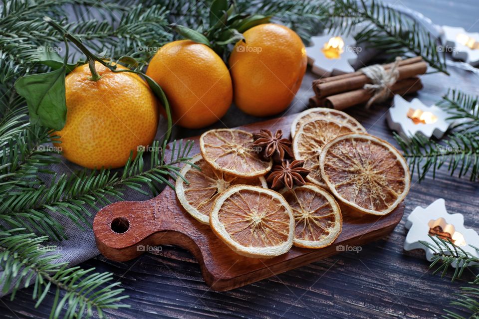 Christmas still life with dried orange and mandarins