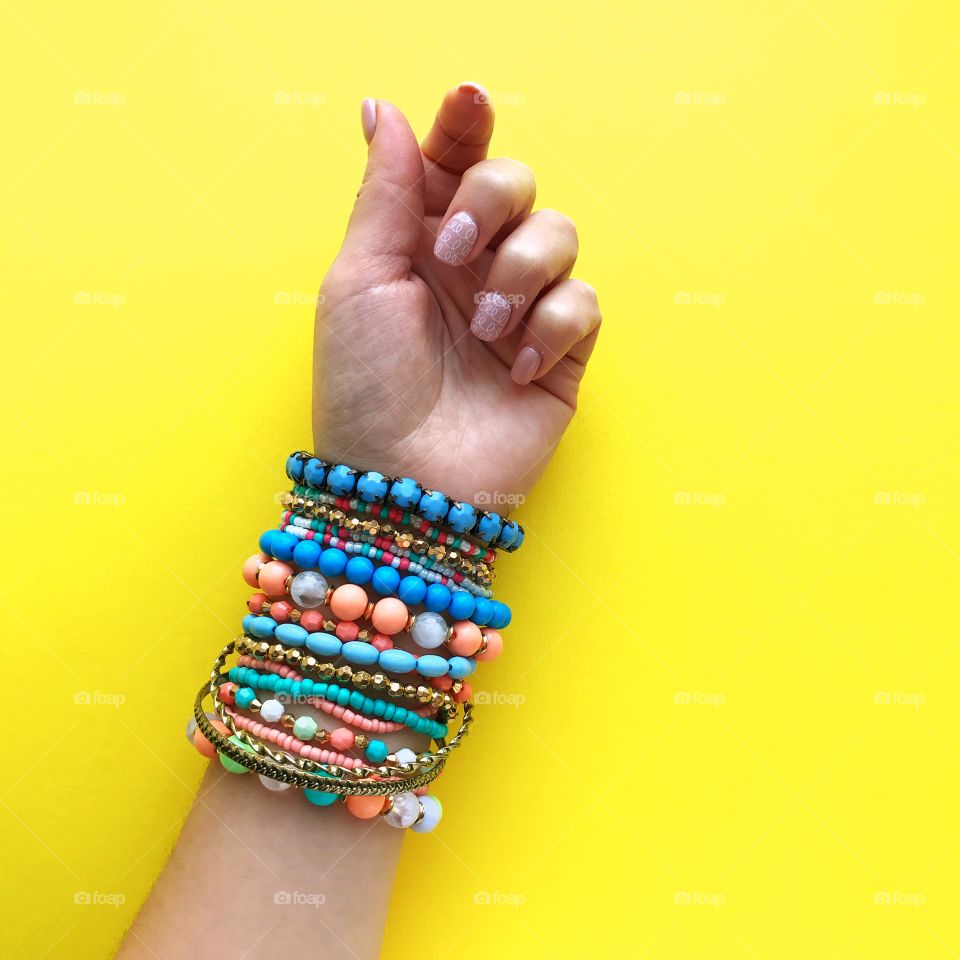 Woman hand with bracelets