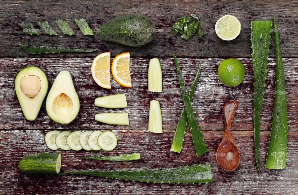 Aloe vera, citrus and avocado arranged.
Medicine. 
Aloe vera on the table