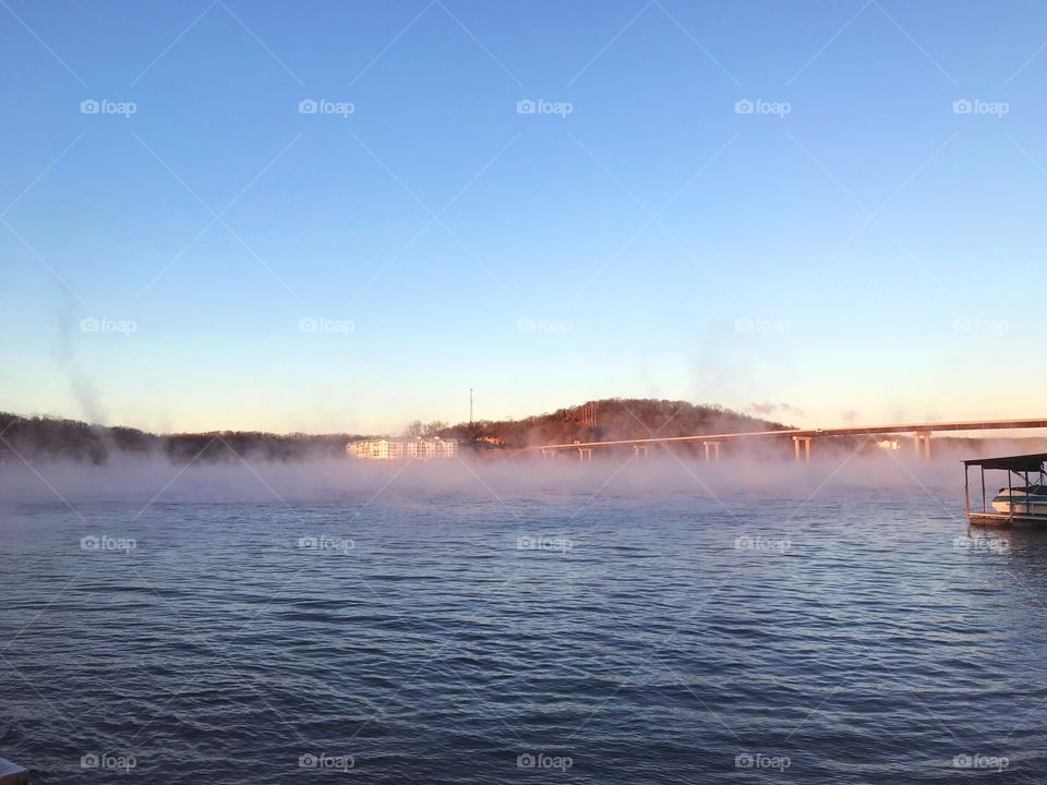 Cold New Year’s Day fog on water