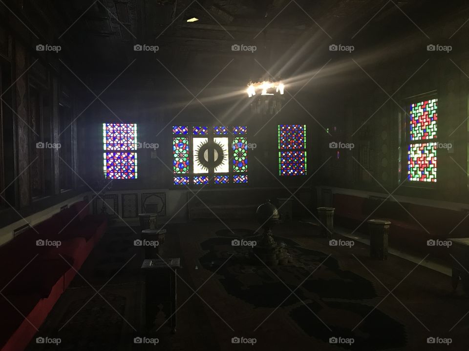 Old place room, colorful windows