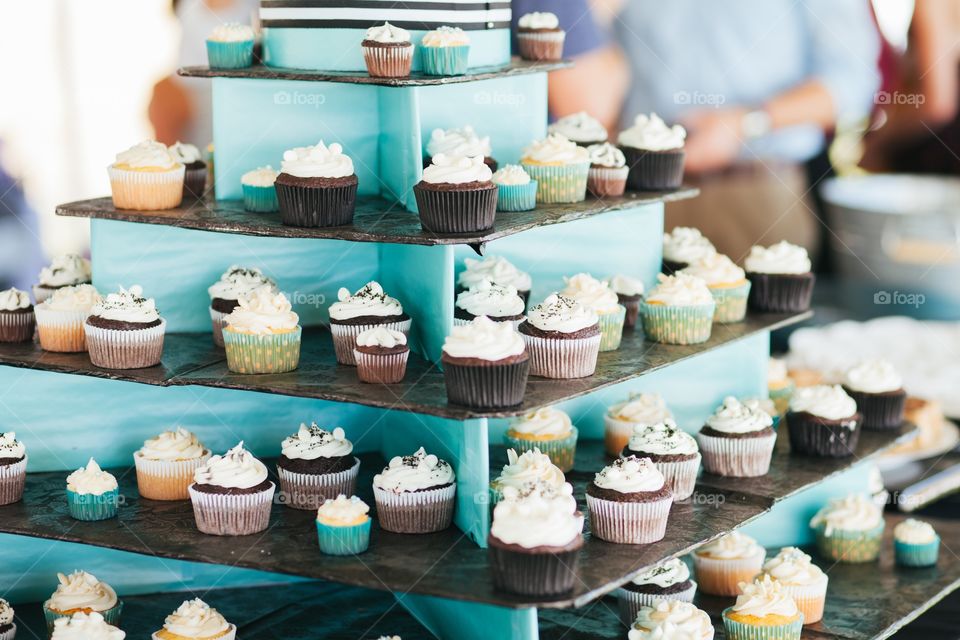 Cupcake display on the wedding dessert table