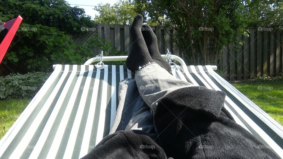 Summer time is... feet up, just chilling in the afternoon sun on the hammock in the backyard