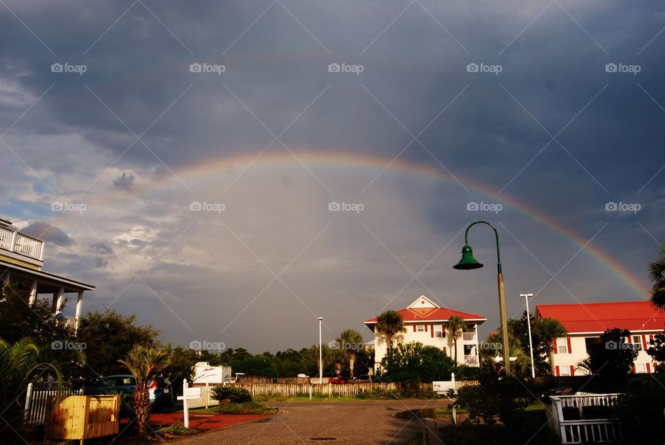 Rainbow over a village