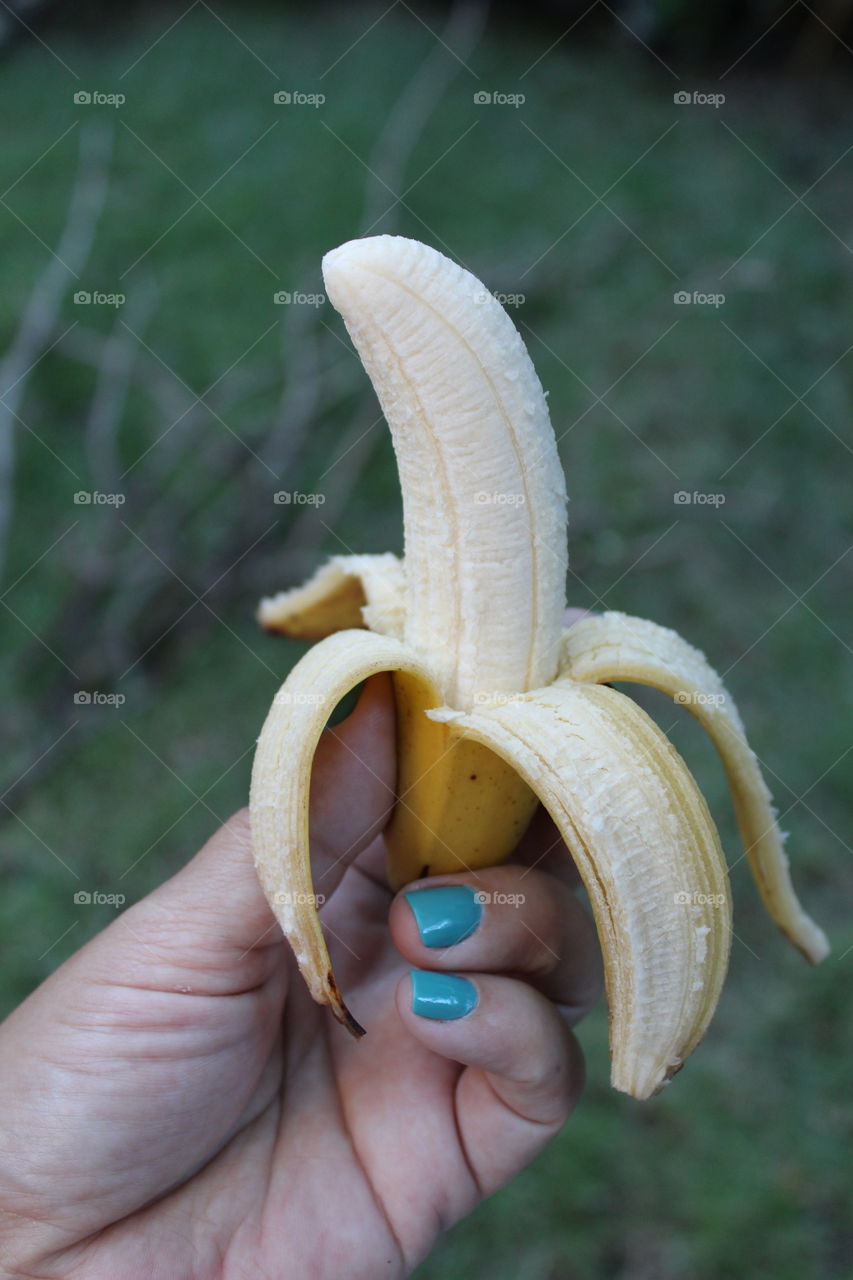 holding banana