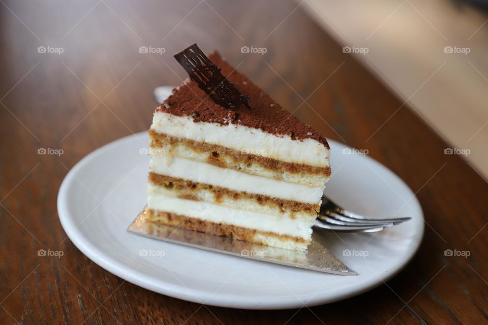 Tiramisu cut in triangle shape 