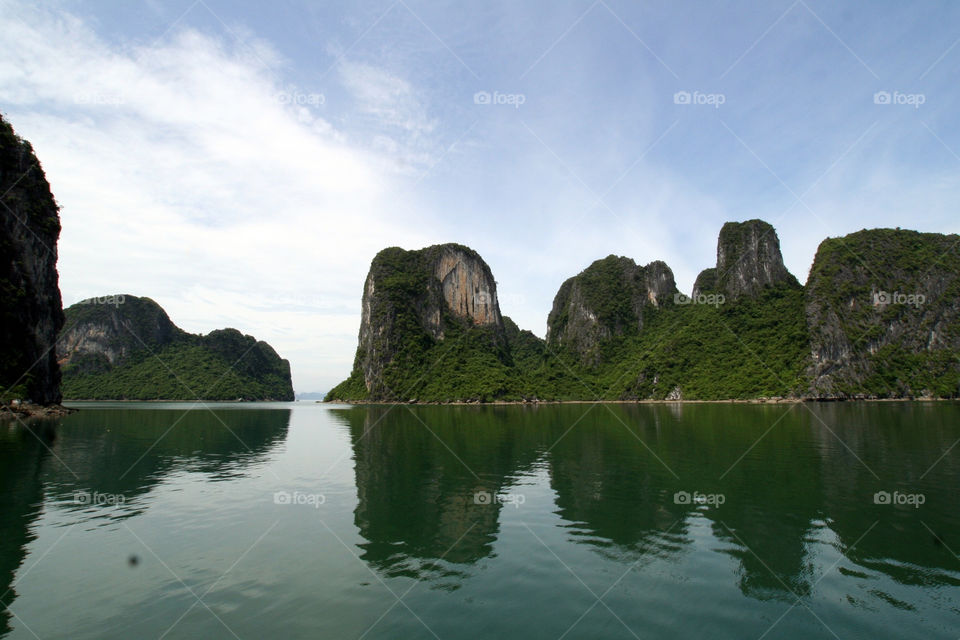 ocean sky clouds mountains by mengzishiliu