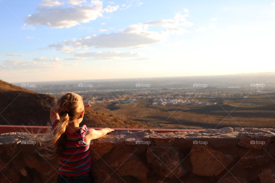 Little girl looking over El Paso, Texas