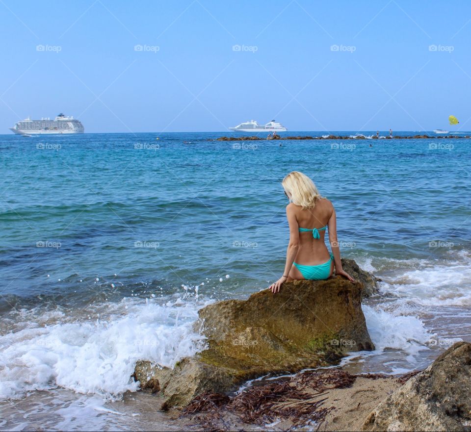 Tanned blonde on the beach