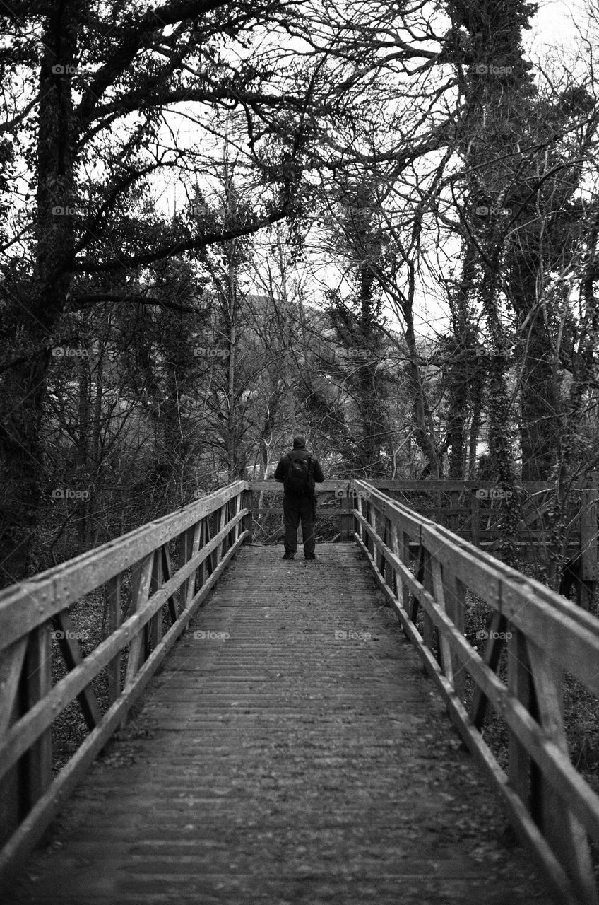 Man on a bridge