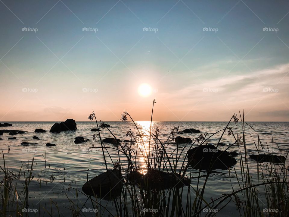 Sunset over a rocky beach