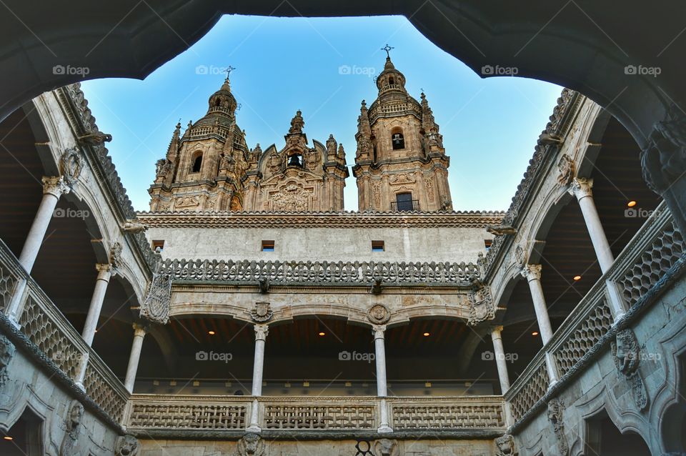 Pontifical University. View of the building of the Pontifical University from inside Casa de las Conchas, Salamanca