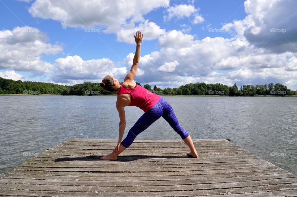 Morning yoga at the lakeside 