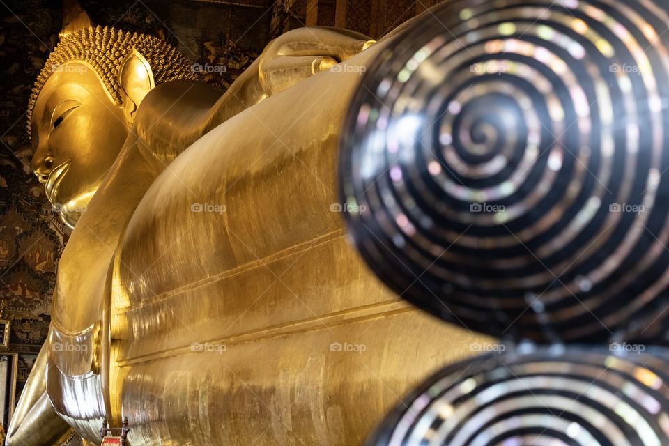 Beautiful view of The big Reclining Buddha at Wat Pho ,the Temple of  the Reclining Buddha Bangkok Thailand