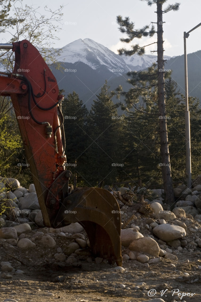 Red eccsvator in the mountain