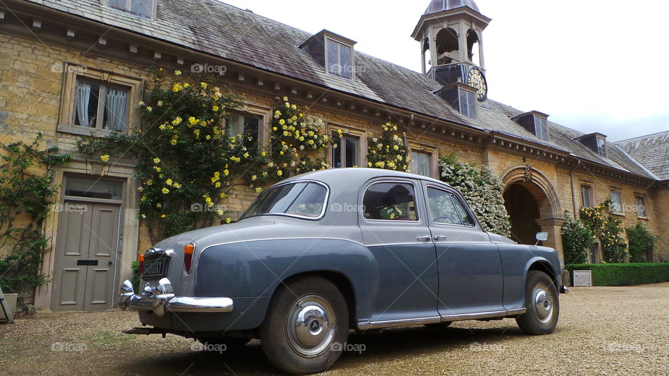 vintage rover in stately home grounds