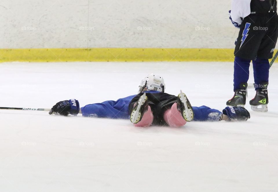 Hockey player falls