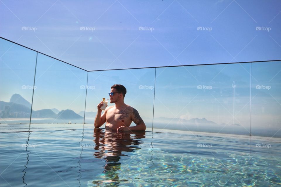 Infinity pool and a cocktail