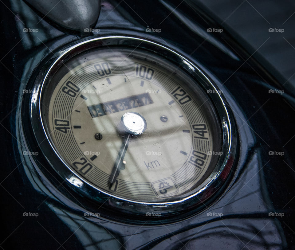 Old retro motorcycle speed meter