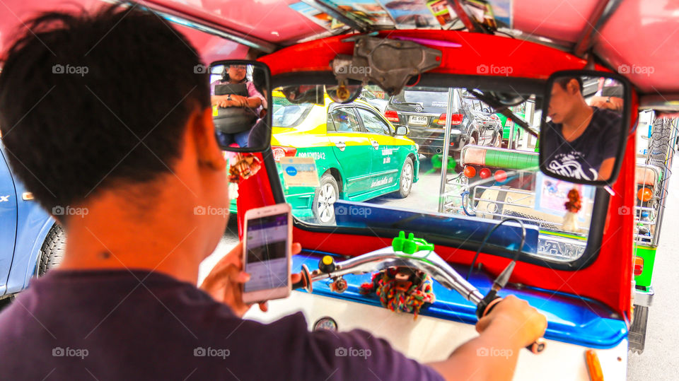 inside the tuk-tuk of bangkok