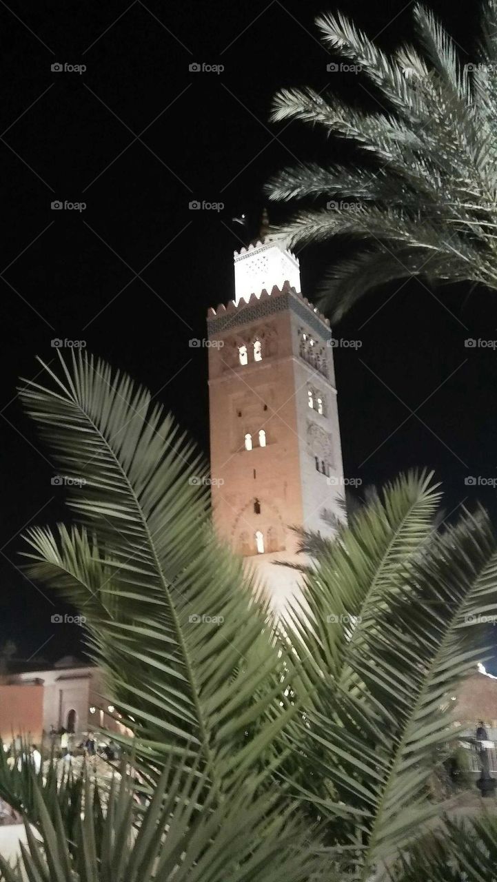 A minaret in the night.