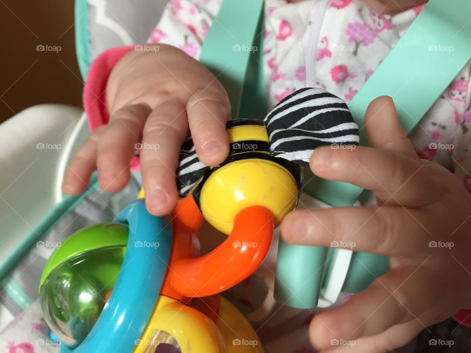 Little working hands on the bee