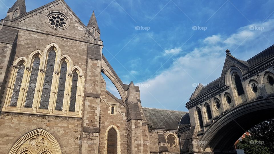 Stunning beautiful medieval Gothic Church and bridge under blue sky