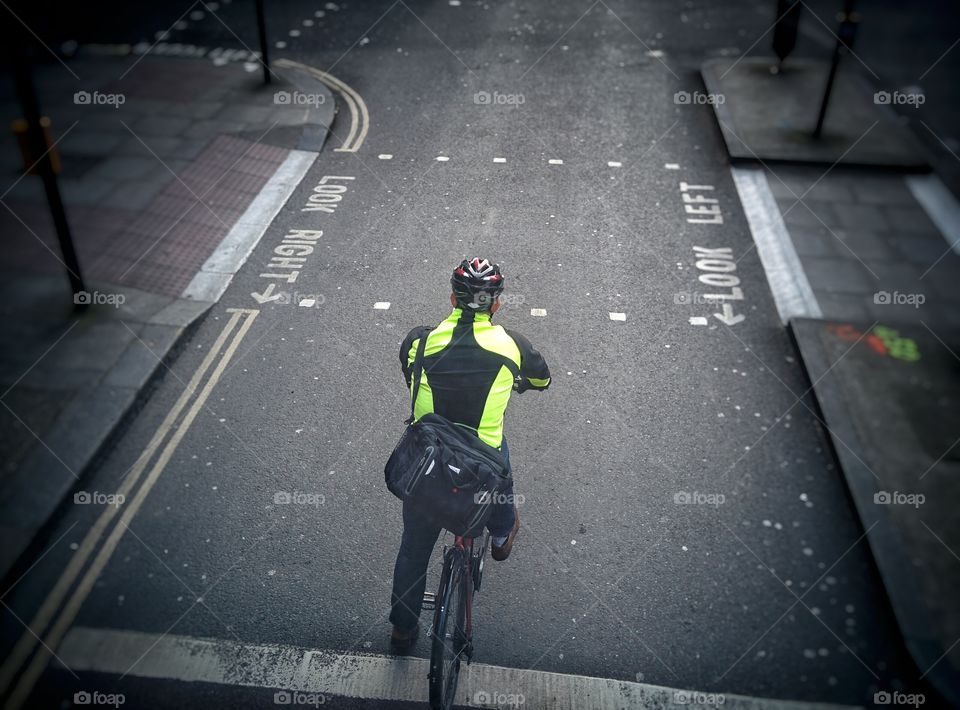 cyclist on road look right look left traffic light