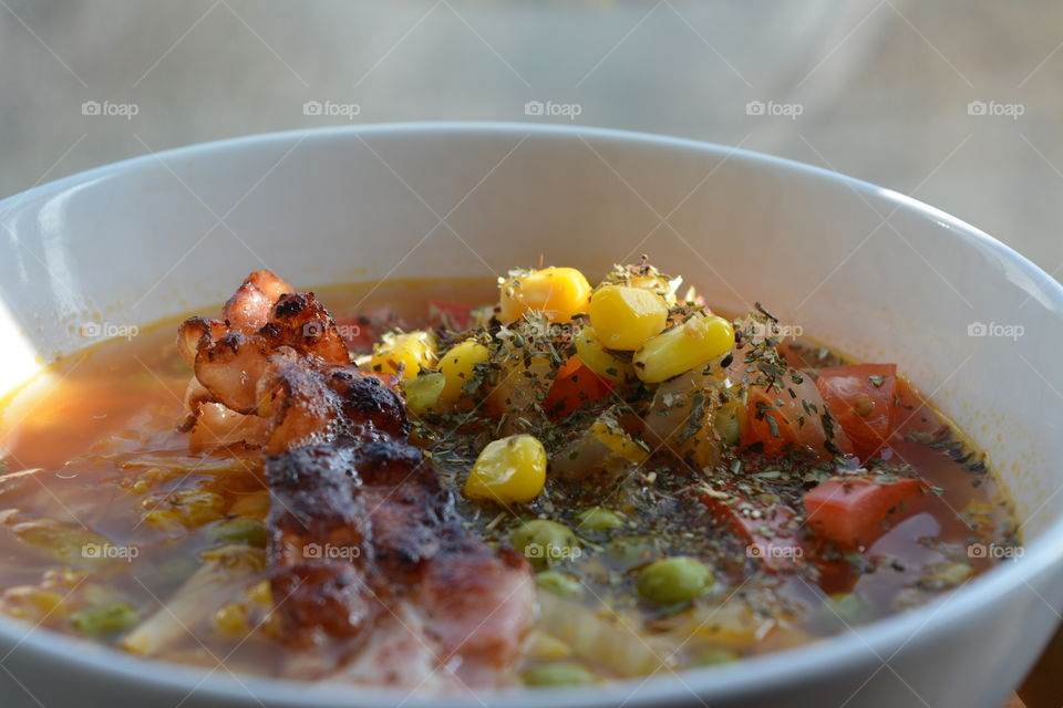 Close-up of chicken soup in bowl